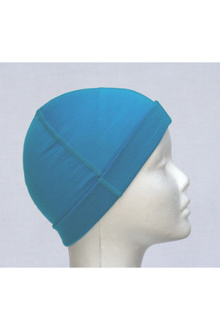 Fine, super comfy merino wool beanie in turquoise. Great for walkers and hikers and people undergoing chemotherapy